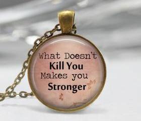 1 inch Round Pendant Tray - What Doesn't Kill You Makes You Stronger